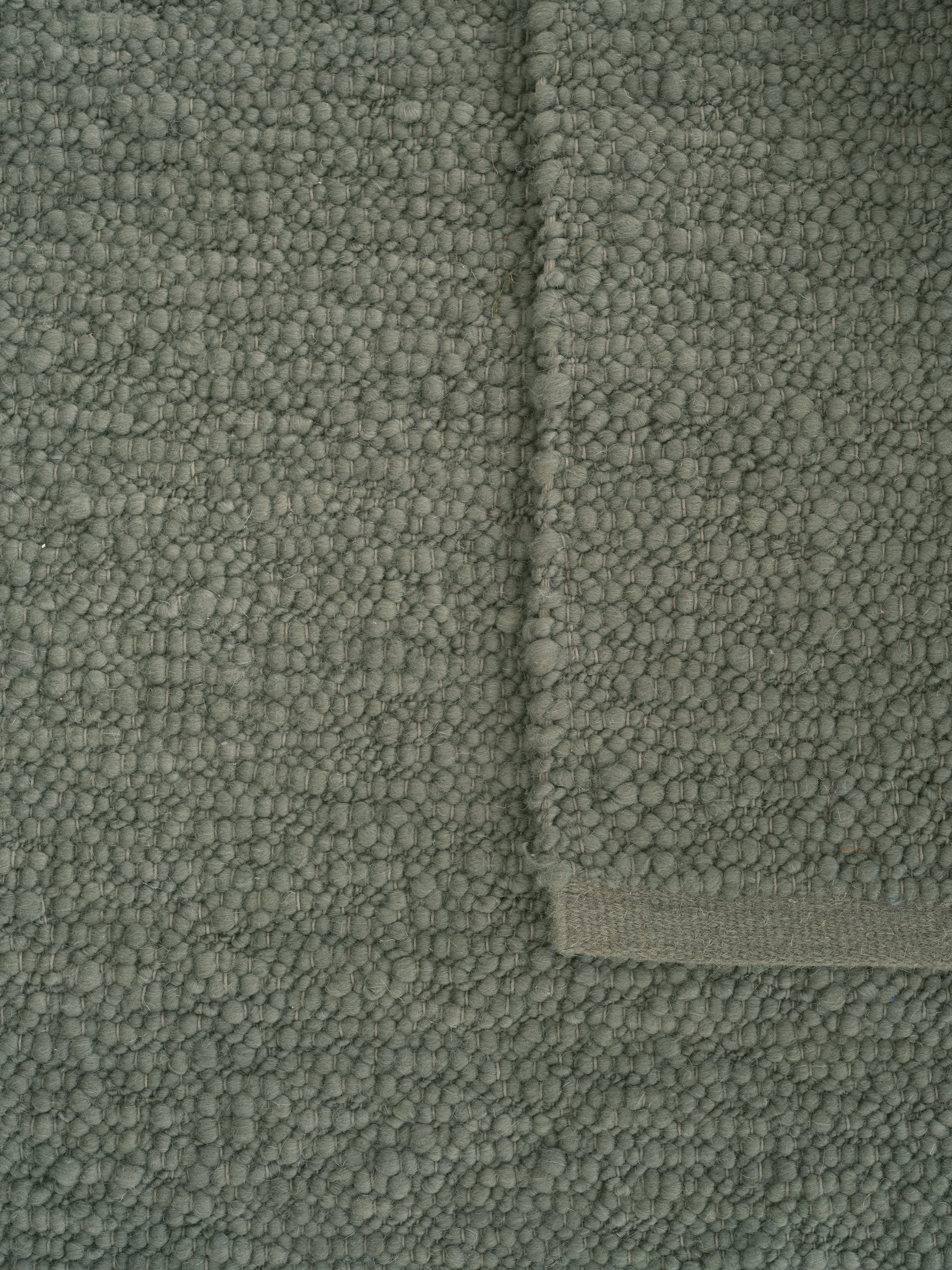 Teppich PEBBLED POEM grün Moos