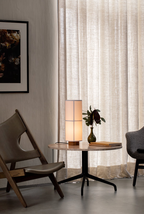 KNITTING cream armchair with oak base