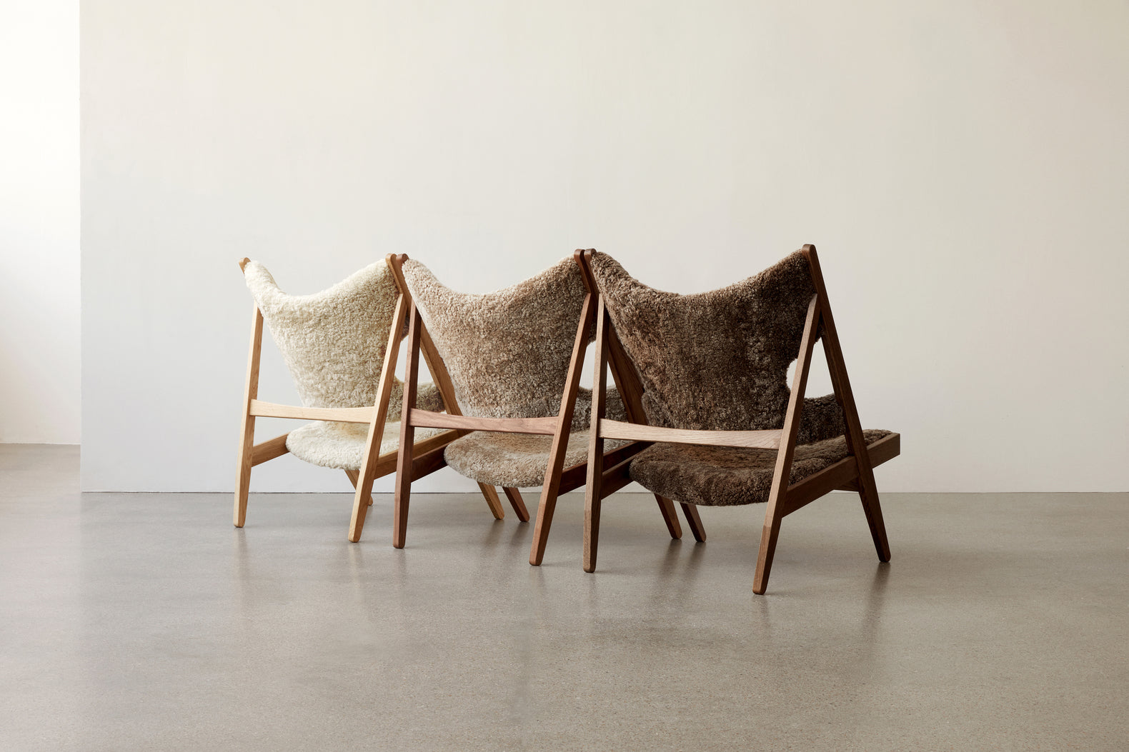 KNITTING armchair brown sheepskin with walnut base