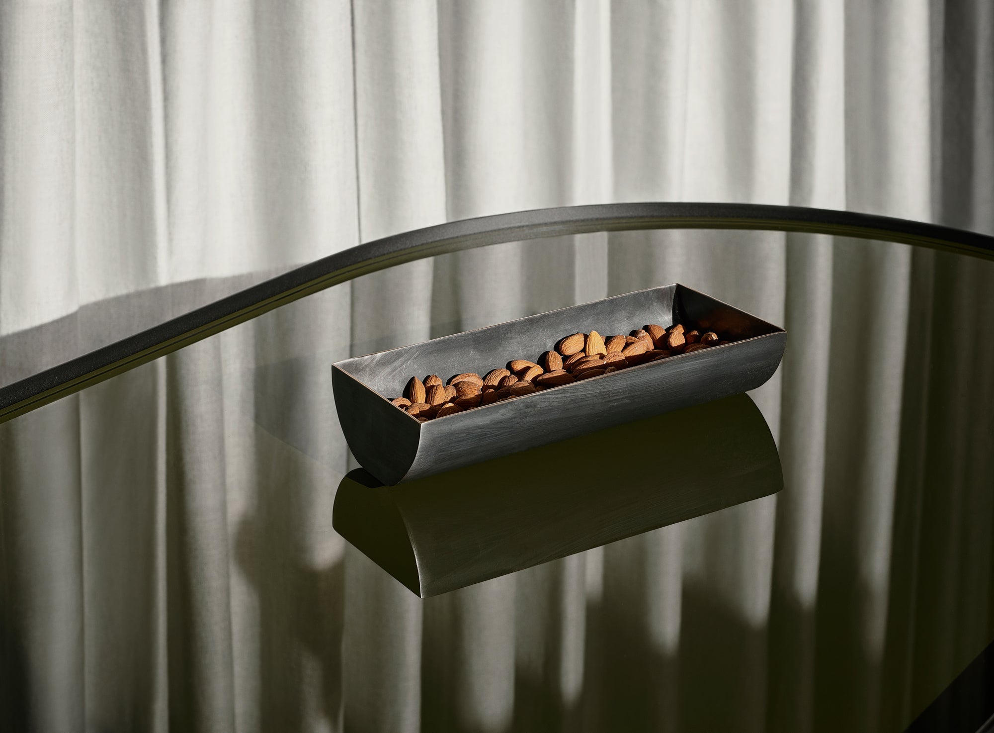 NONO coffee table brown glass with black base