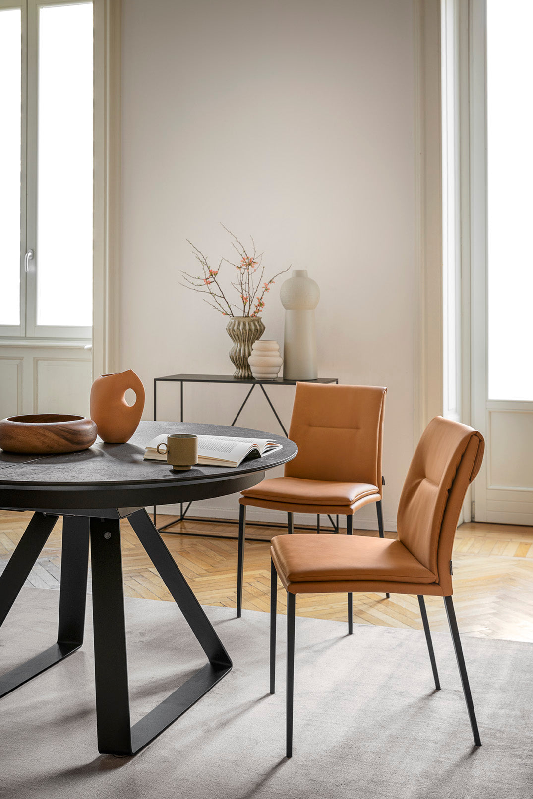 CARMEN LARGE upholstered chair with a black base