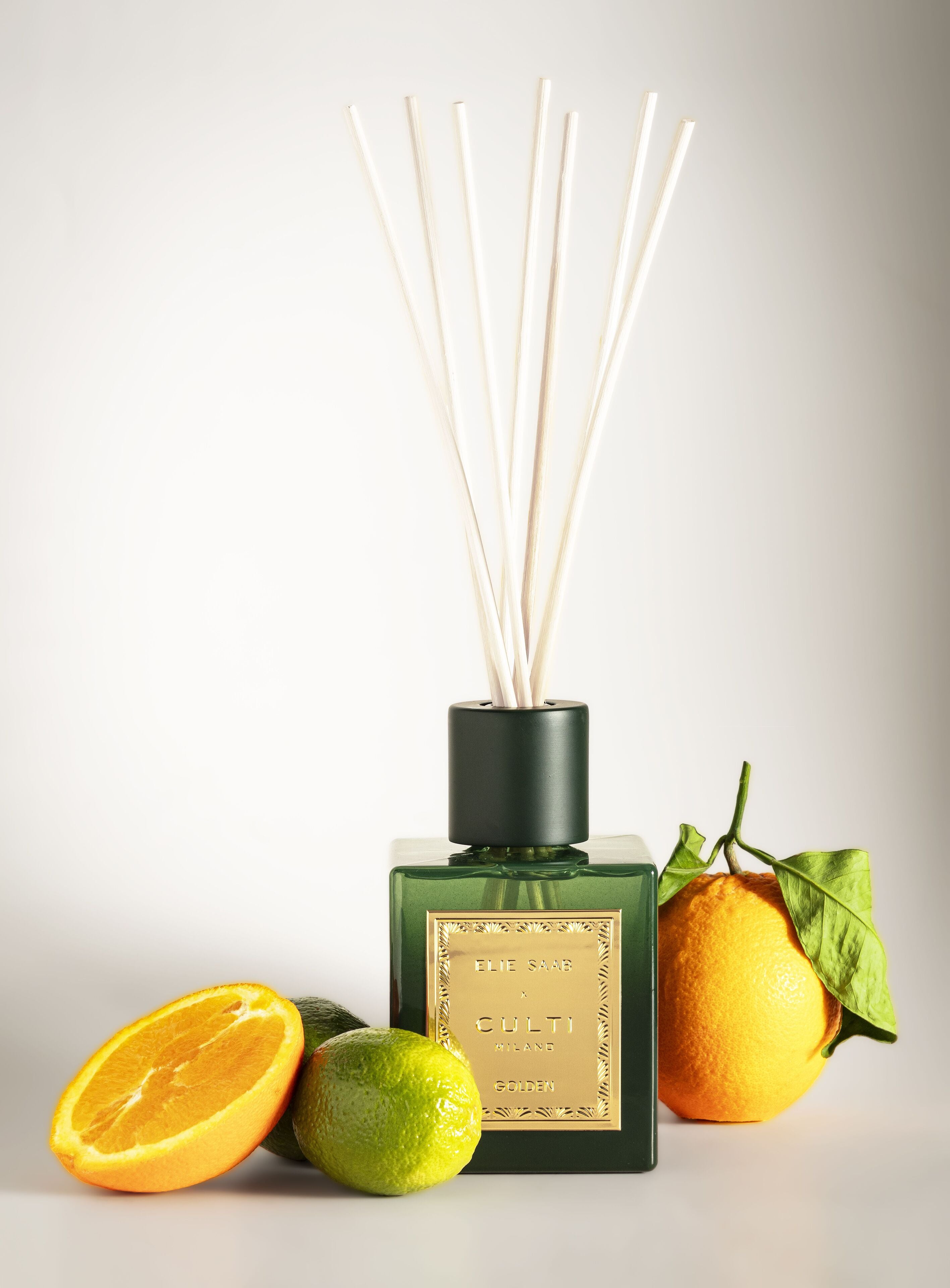 GOLDEN fragrance diffuser with notes of bitter orange, mandarin, ginger, orange blossom, and cedar.