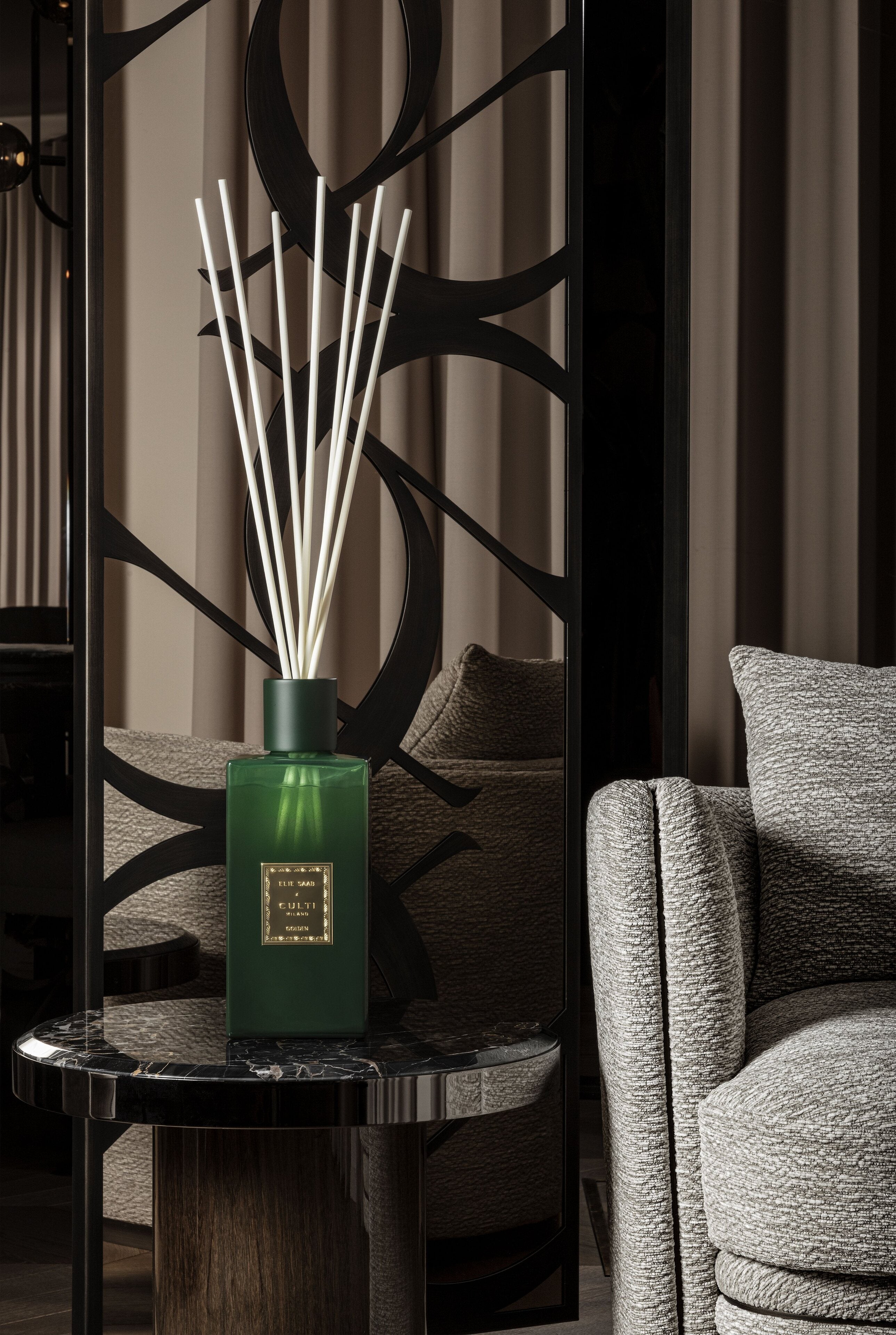 GOLDEN fragrance diffuser with notes of bitter orange, mandarin, ginger, orange blossom, and cedar.