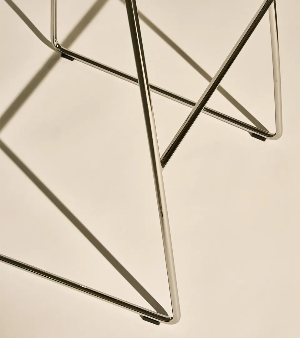 GUBI 3D stool with black seat and chrome base