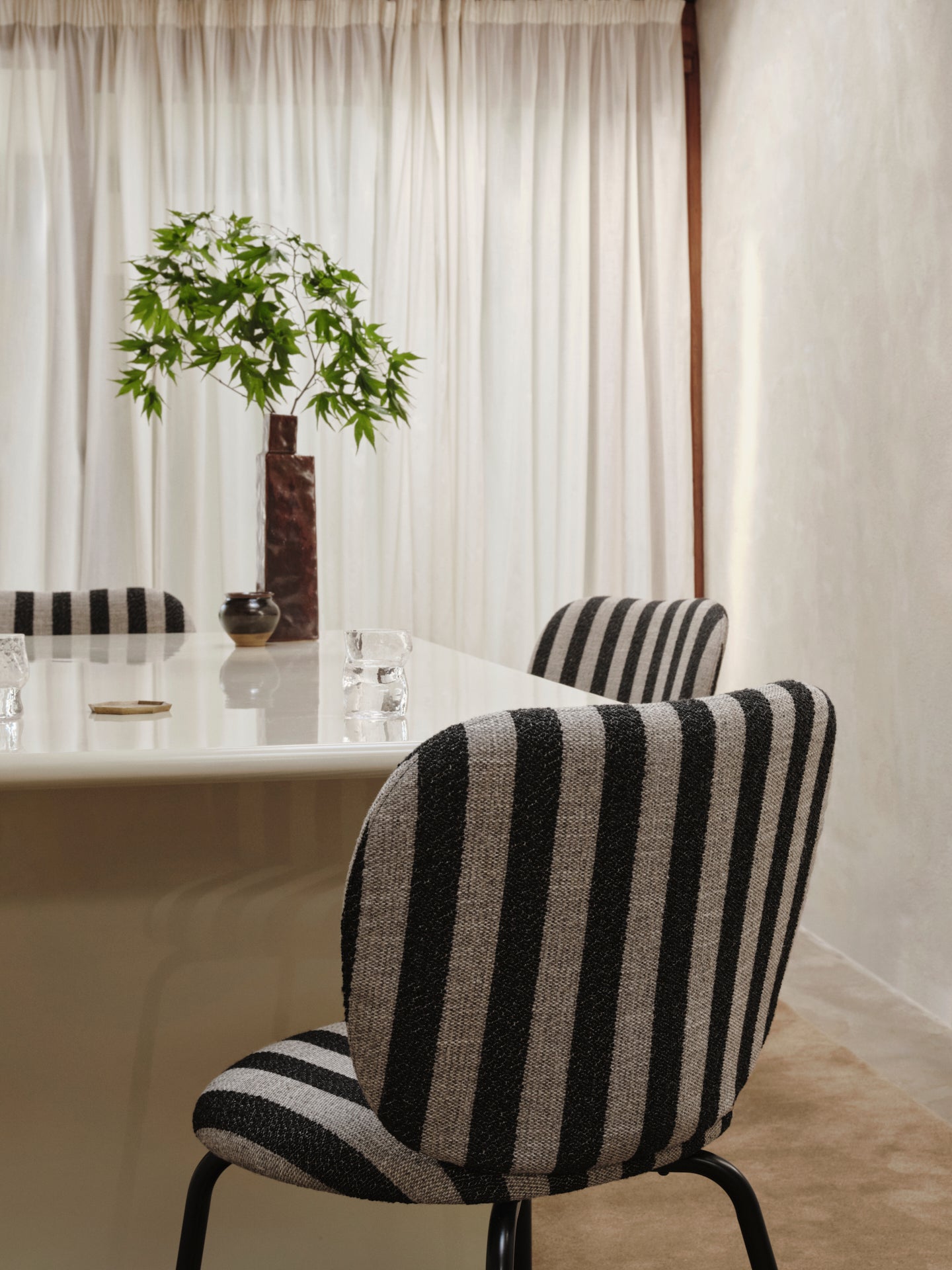 Rico Louisiana black and white chair with a black base