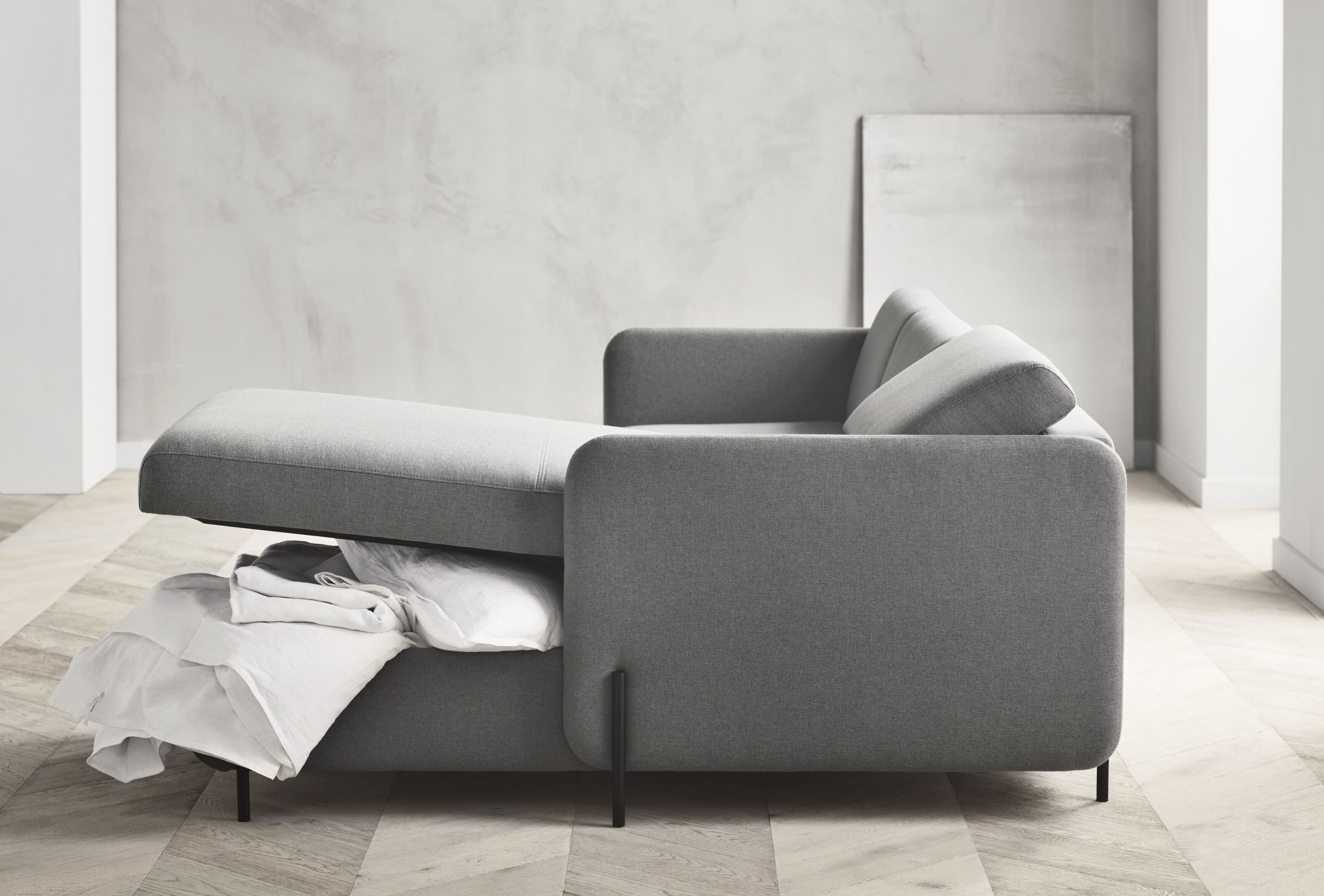 Sofa met een 2,5-zitplaats PIRA met stalen basis