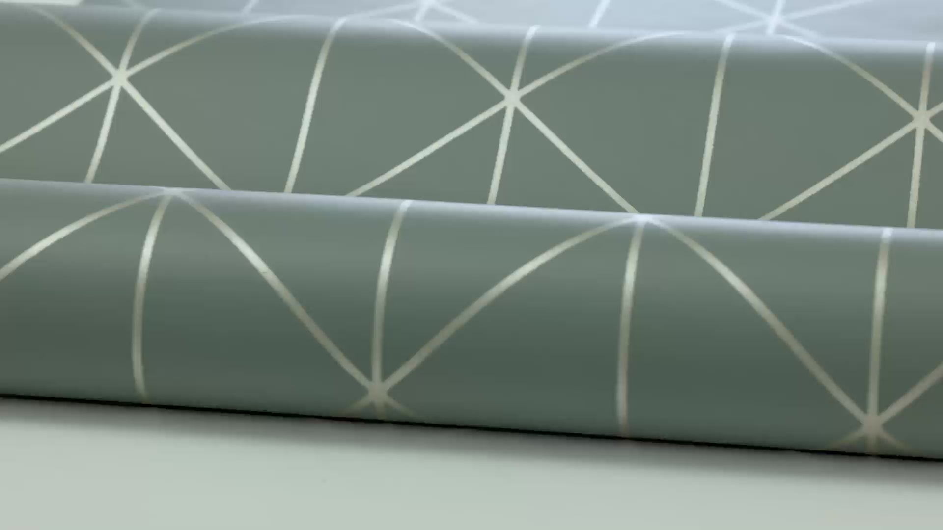 Non-woven paper wallpaper with a geometric DIAMONDS pattern in green