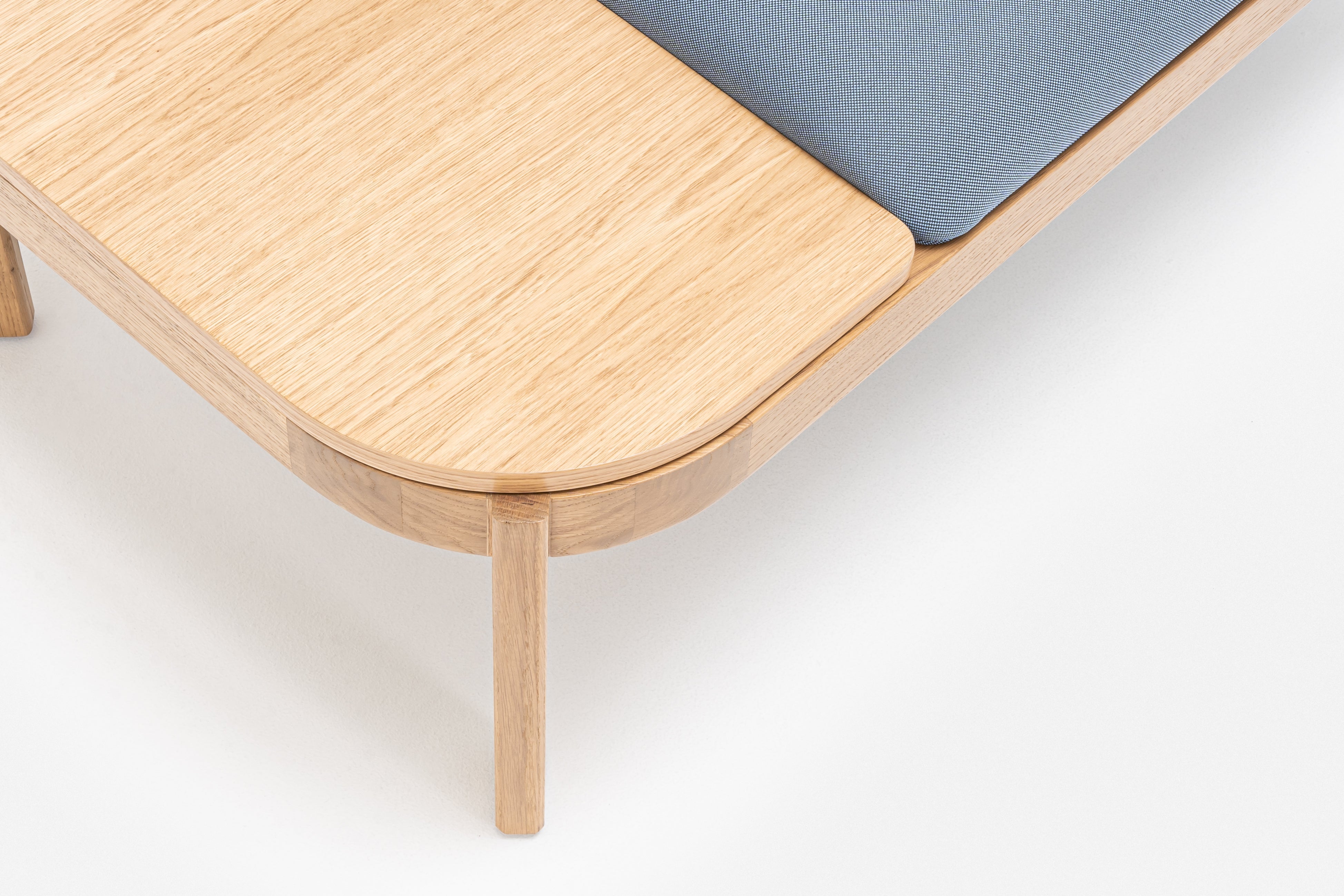 Upholstered bench with ramps of the wooden base