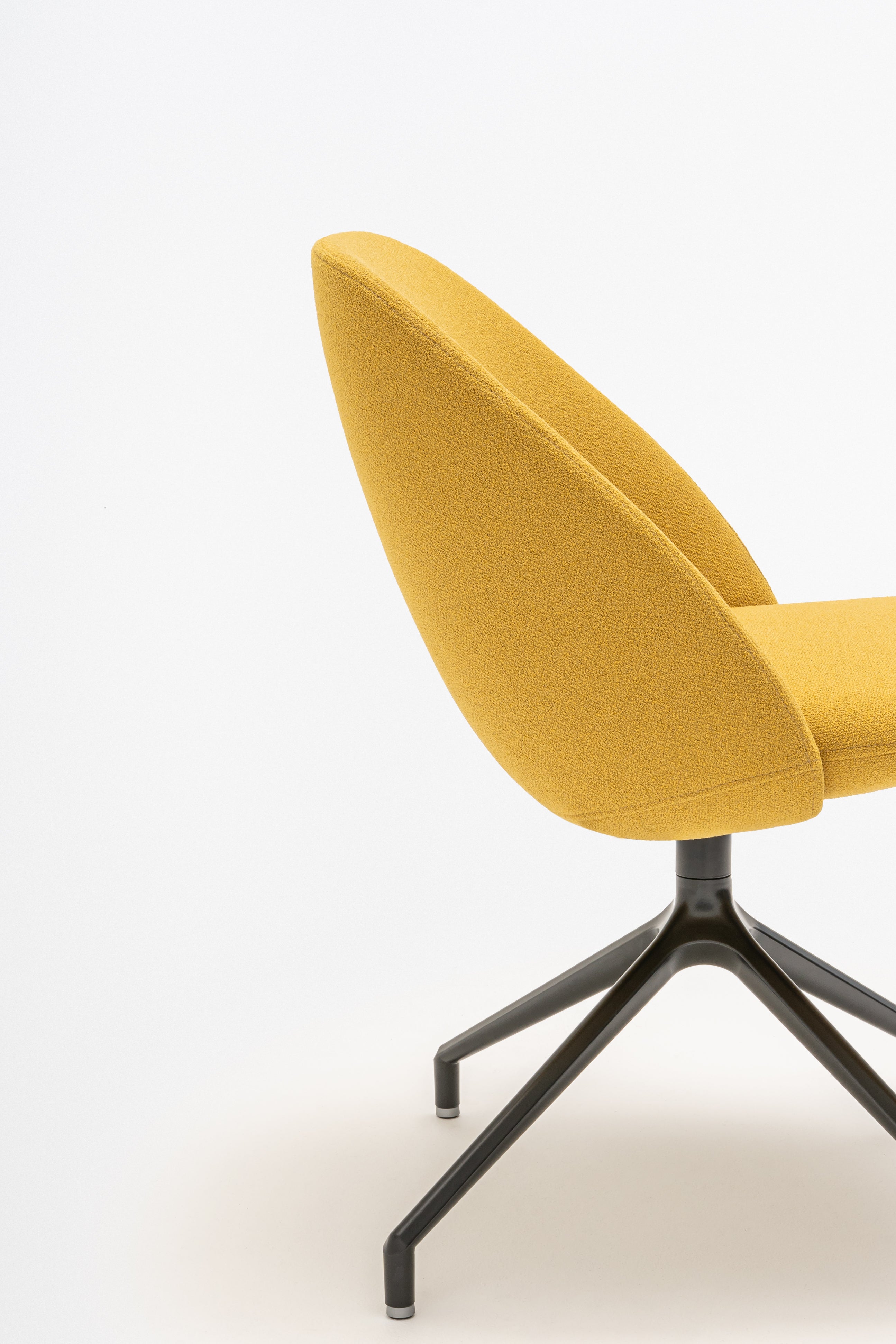 Rotable armchair with low backrest metal parallel base