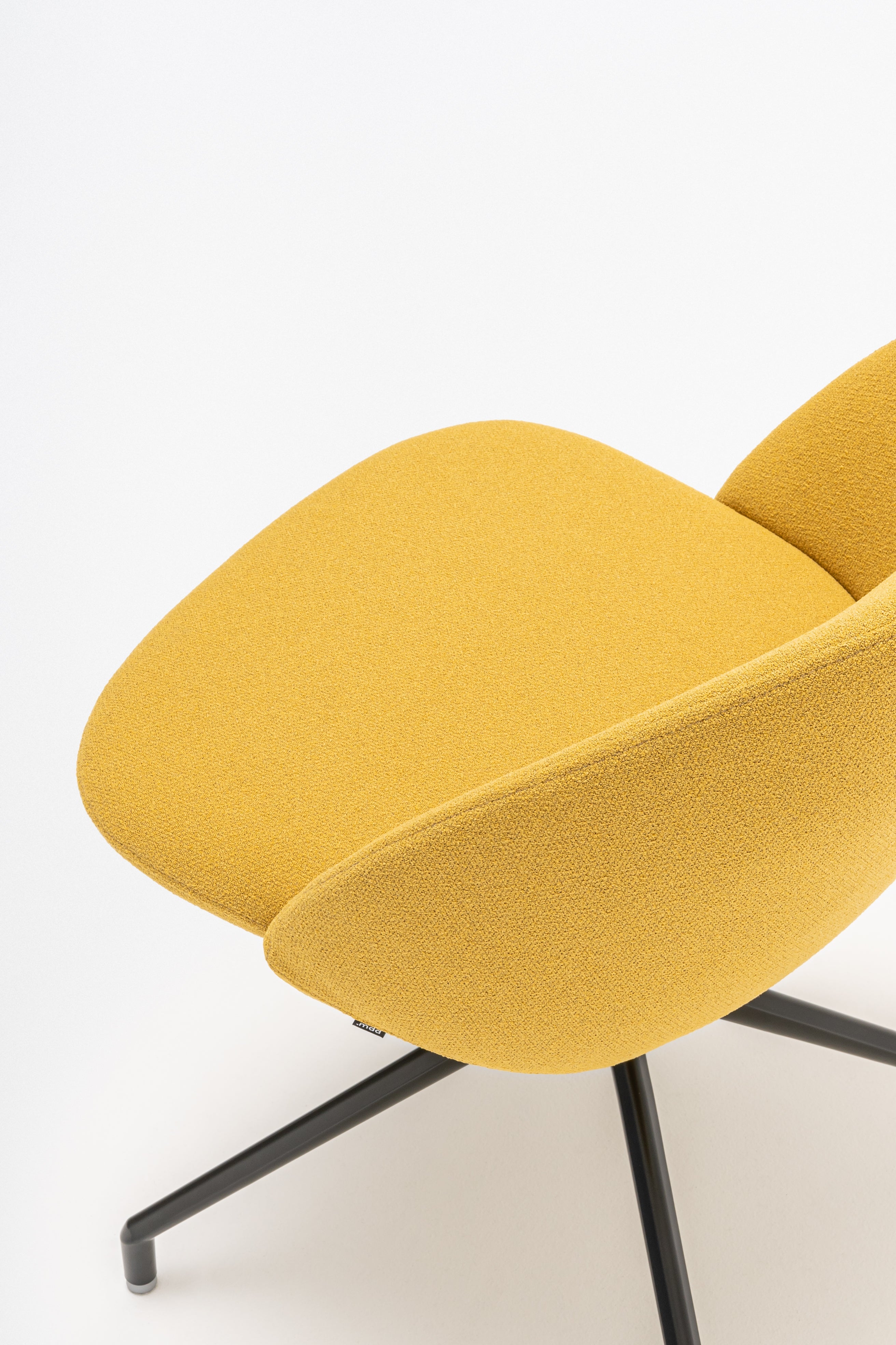 Rotable armchair with low backrest metal parallel base