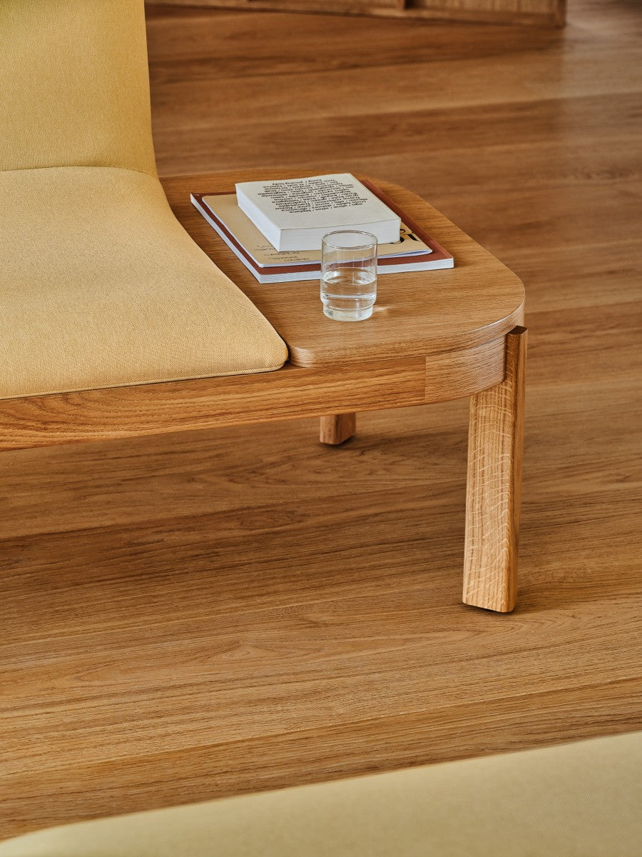 Upholstered bench with ramps of the wooden base